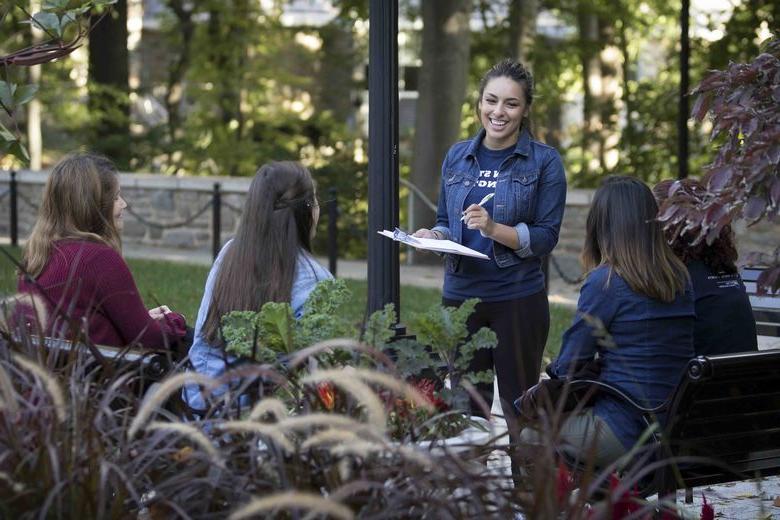 students talking outside